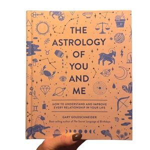 The Astrology of You and Me Book